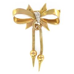 1950s Diamond Gold Tank Tubogaz and Bow Brooch 6