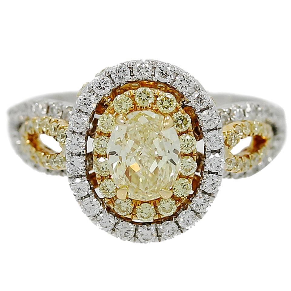 Oval Fancy Intense Yellow Diamond Two Color Gold Ring For Sale