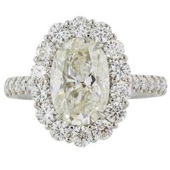 3.00 Carat H/VS1 EGL Certified Oval Diamond Platinum Halo Ring