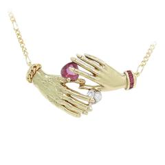 Carrera y Carrera Two Hands Holding Heart Ruby and Diamonds