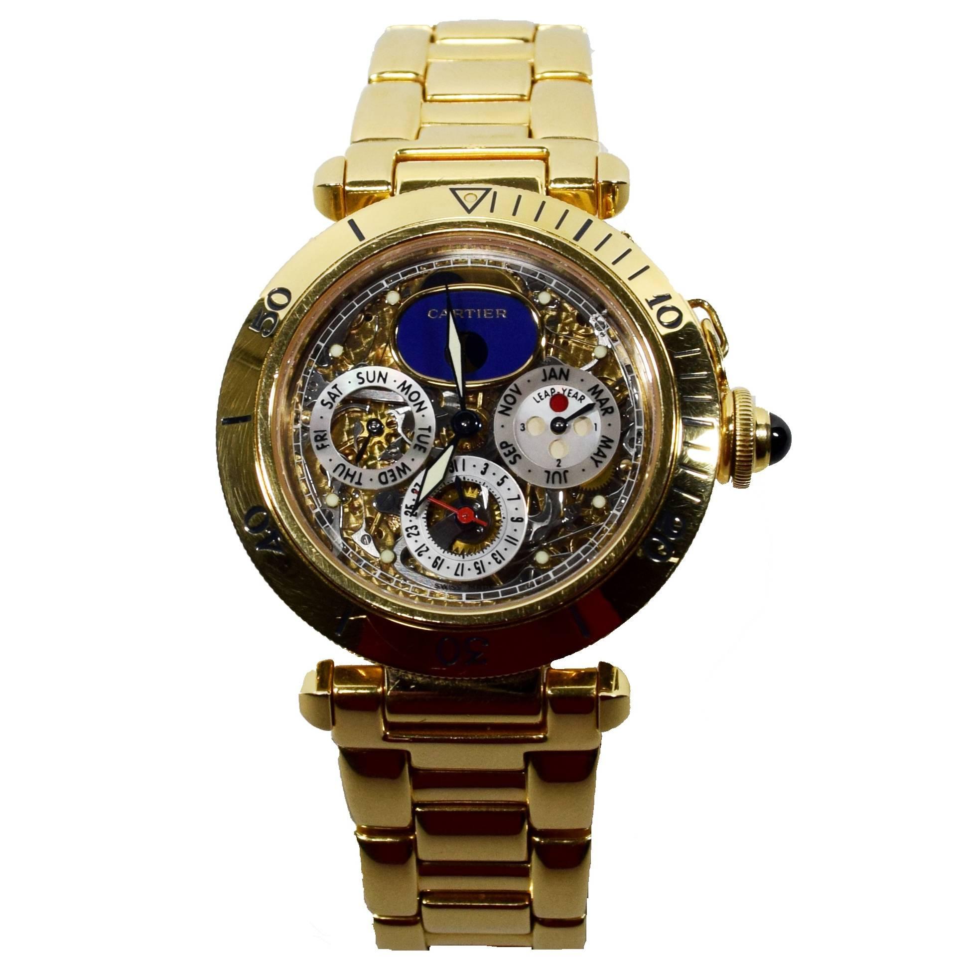 Montre automatique Tourbillon squeletté Pasha de Cartier en or jaune