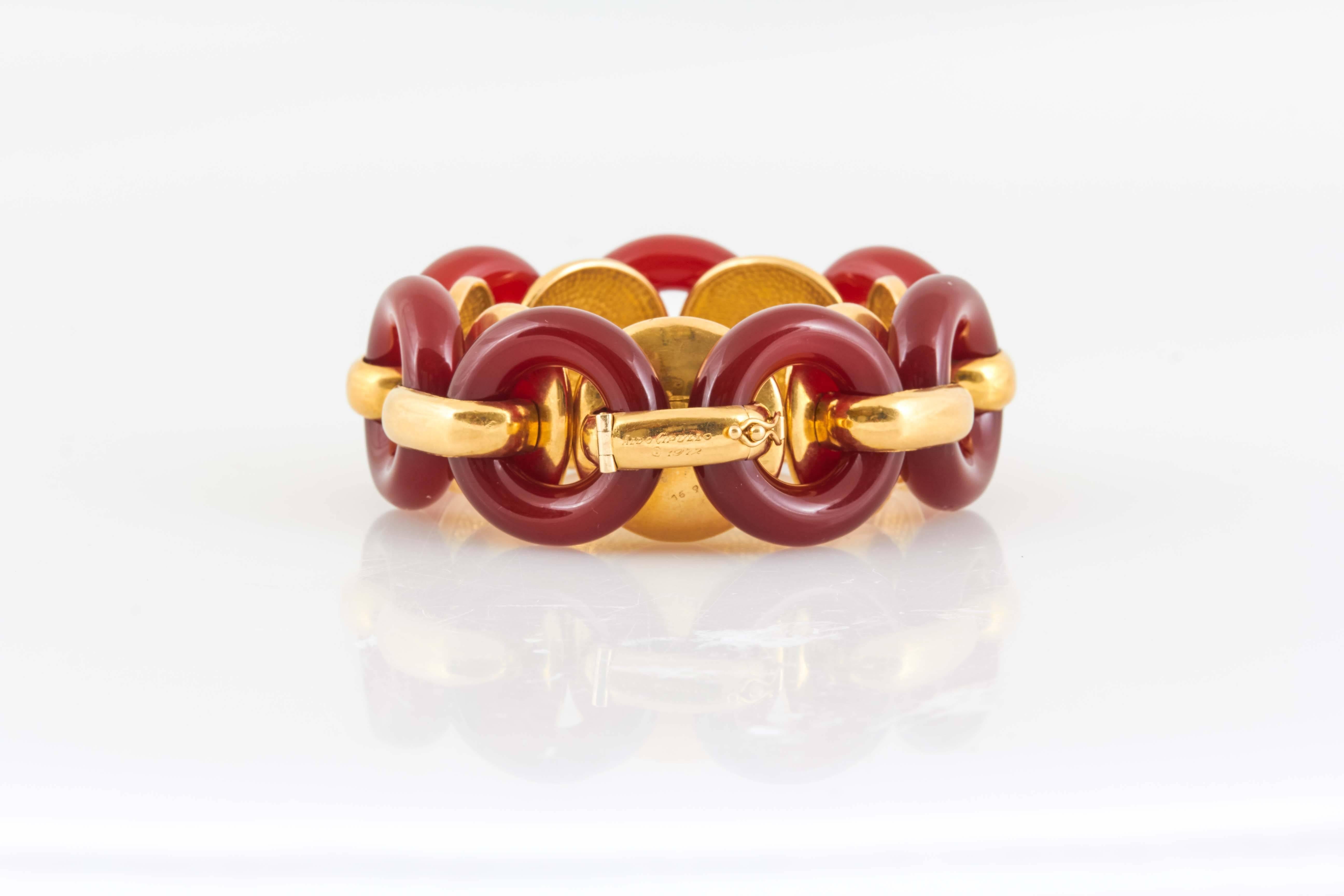 Carnelian Bracelet finely crafted in 18k yellow gold. Signed by Cartier. 
