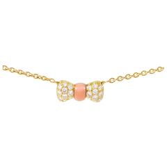 Van Cleef & Arpels Coral Diamond Gold Bow Pendant Necklace