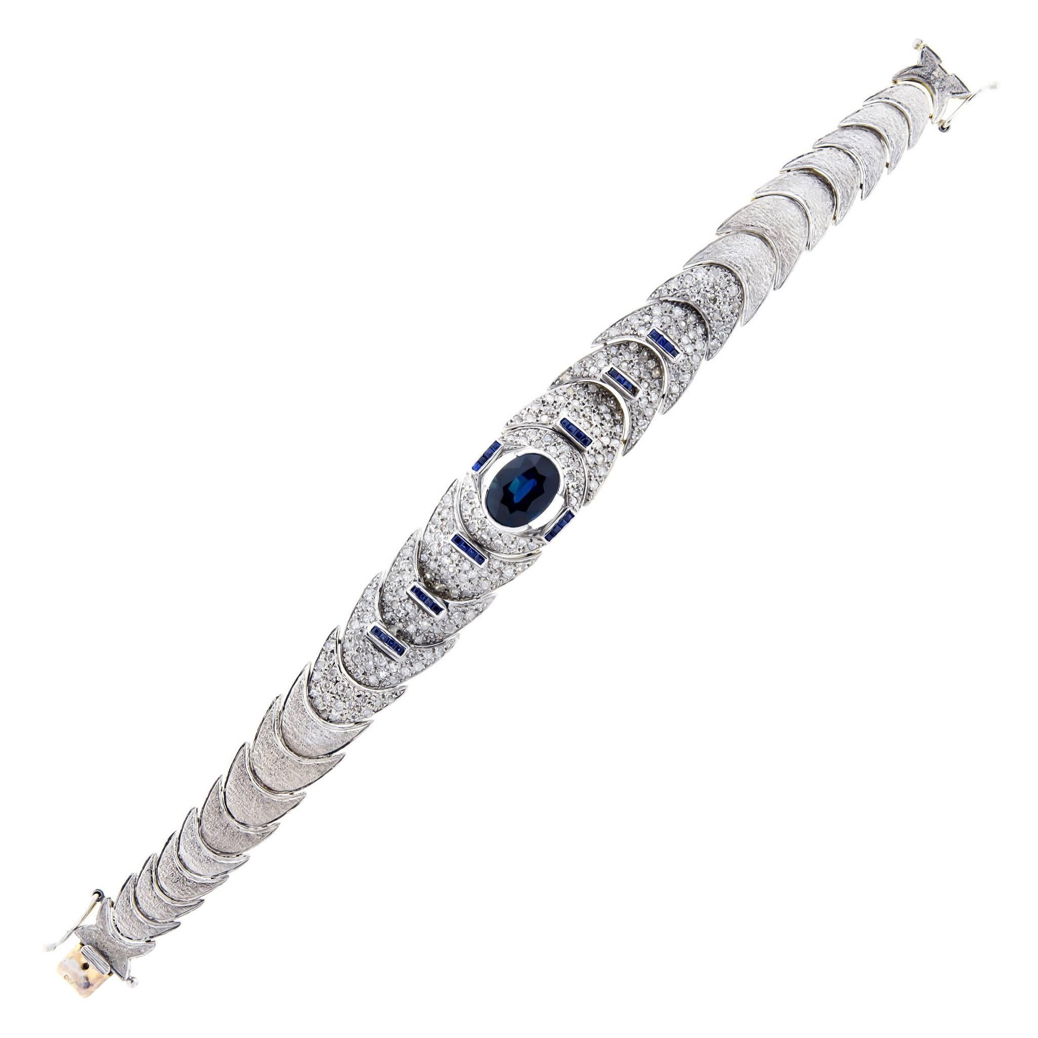 Stunning Blue Sapphire Diamond and 18 Karat White and Yellow Gold Bracelet For Sale