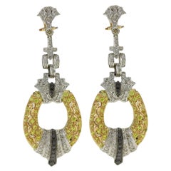 Orecchini Chandelier con diamanti bianchi e neri, zaffiri, oro bianco e giallo