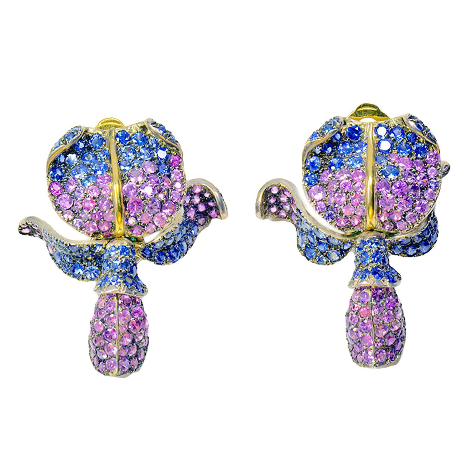 Unique Glycine's Flower Ear Clips 18K Gold, pave set Emeralds and Sapphires For Sale