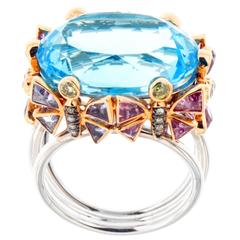 Impressive Blue Topaz, Pink Sappire Yellow Diamond Ring