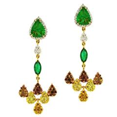 Emerald Color Diamond Earrings in 18k gold