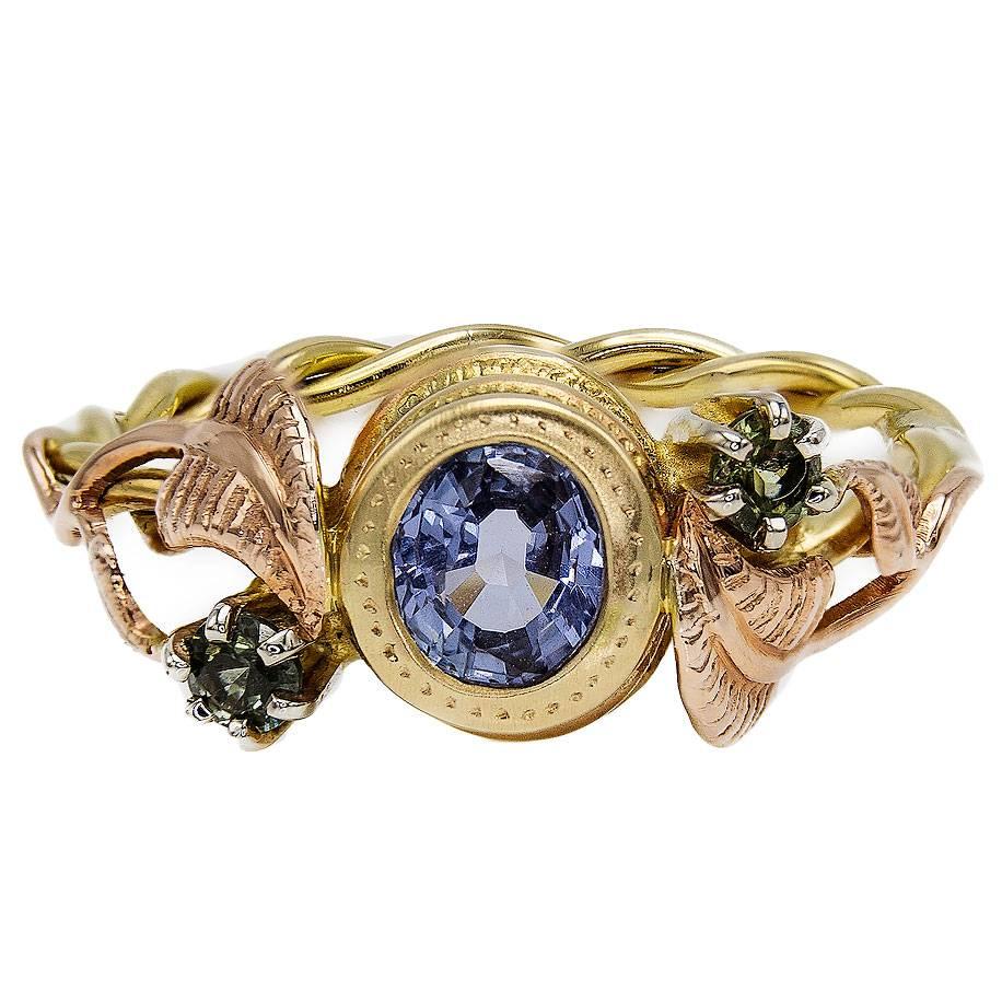 Artisan Sapphire Ring with Rose Gold Leaves and Detailed Bezel