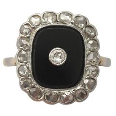 1920s Art Deco Black Onyx and Diamond Yellow Gold Cocktail Ring