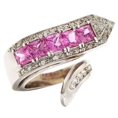 Stunning 14 karat White Gold with Pink Sapphire and Diamond Crossover Ring