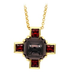 Modern Garnet and Gold Cross Pendant Necklace