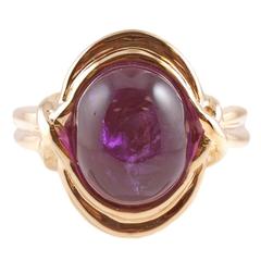 Cabochon-cut amethyst gold ring