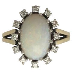 1960s 3.01 Carat Opal and 0.38 Carat Diamond, Yellow Gold Dress Ring 1