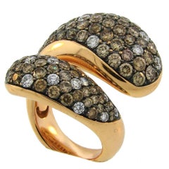 De Grisogono Bague serpent stylisé en or rose et diamants