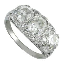 Edwardian Diamond Platinum Three Stone Filigree Ring