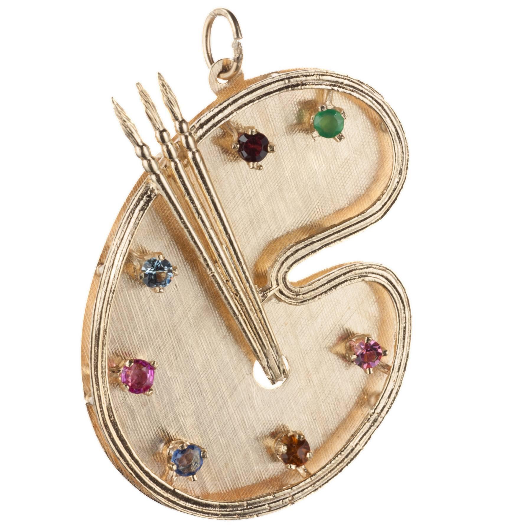 Artist’s palette charm with multi-colored gemstones in 14-karat gold