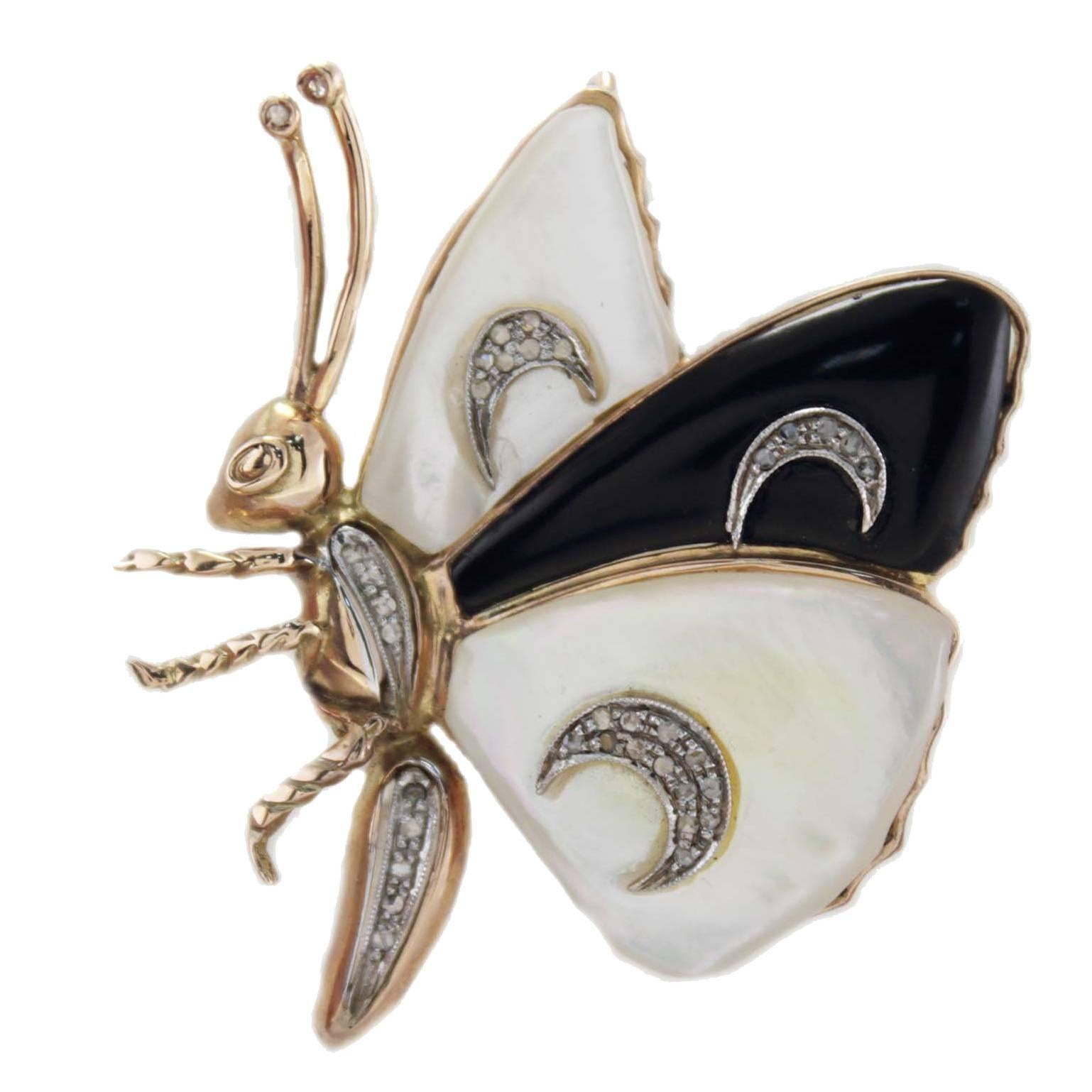 Broche papillon en or, agate noire et diamants blancs en vente