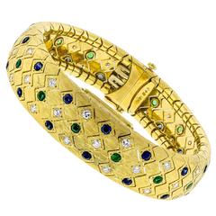 Yellow Gold Diamond Sapphire Emerald Concealed Wristwatch