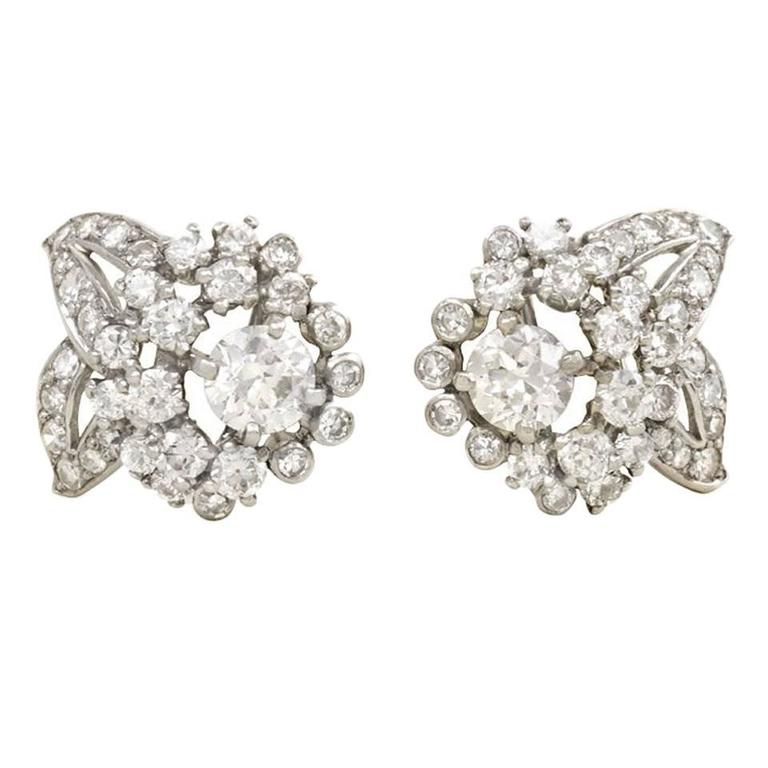 1950s Cartier Diamond Platinum Flower Cer Earrings At 1stdibs 1950s Cartier Diamond Platinum Flower Cer Earrings For