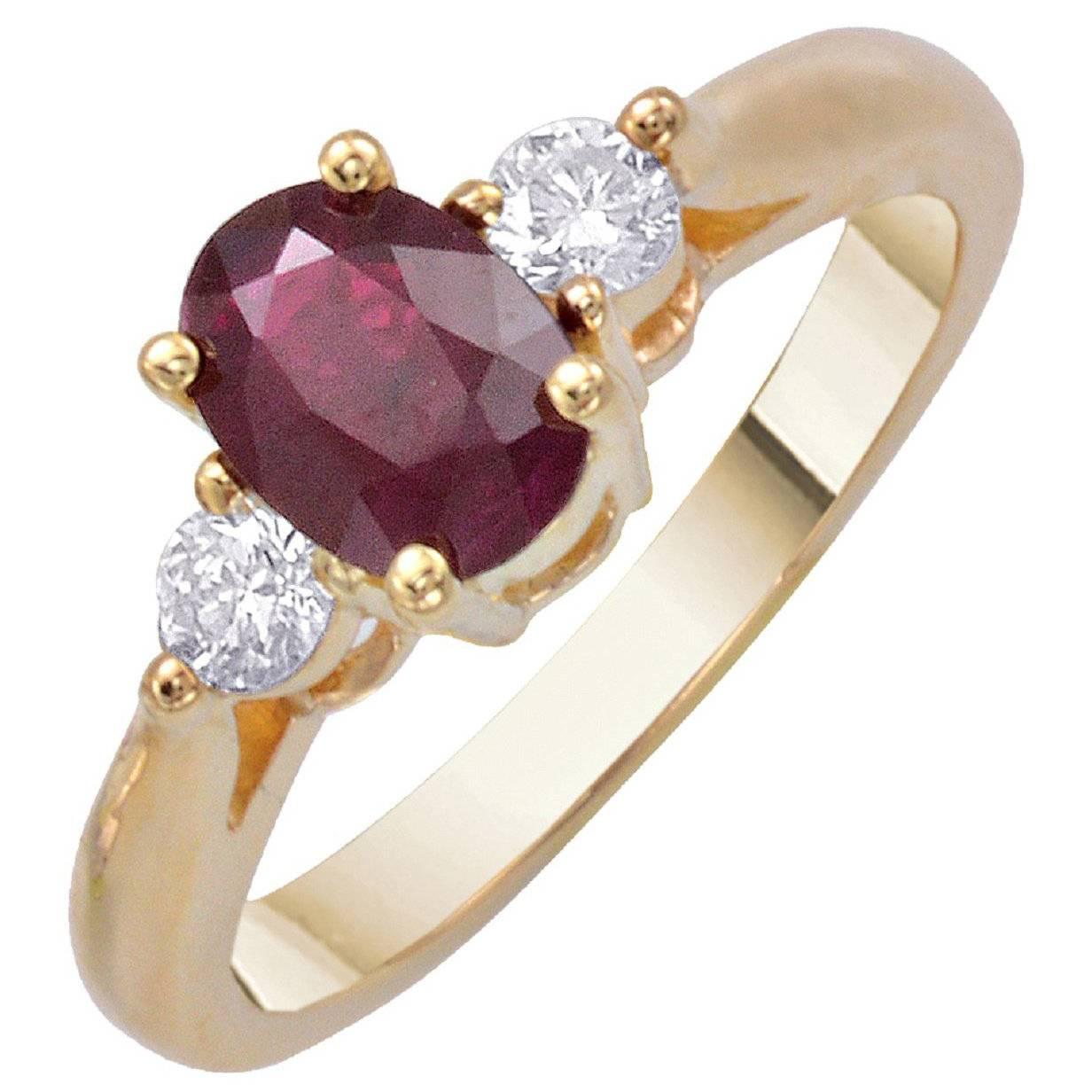 1.25 Carat Oval Ruby Round Diamond Yellow Gold Three-Stone Engagement Ring
