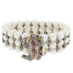 Bracciale Luise con perle, rubini, smeraldi, granati e diamanti in argento e oro