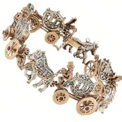 Luise Carriages Bracelet in Silver and Gold with Emeralds Rubies and Diamonds 