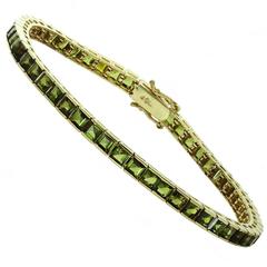 Straight-Line Channel-Set Square-Cut Genuine Green Peridot Yellow Gold Bracelet