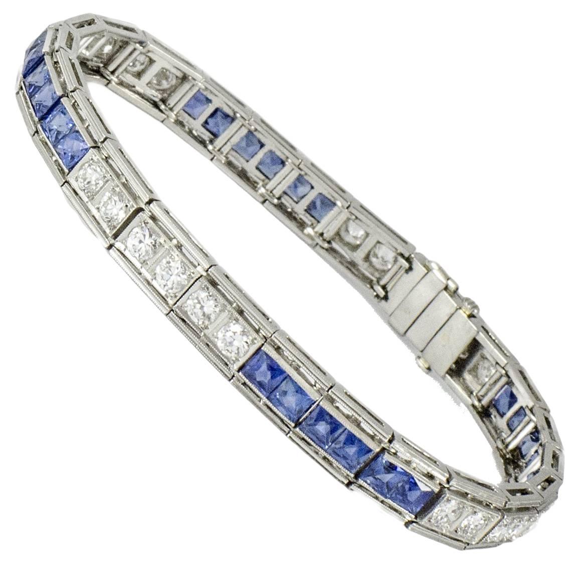 Art Deco Platinum Diamond and Sapphire Line Bracelet by: Howard H. Patch For Sale