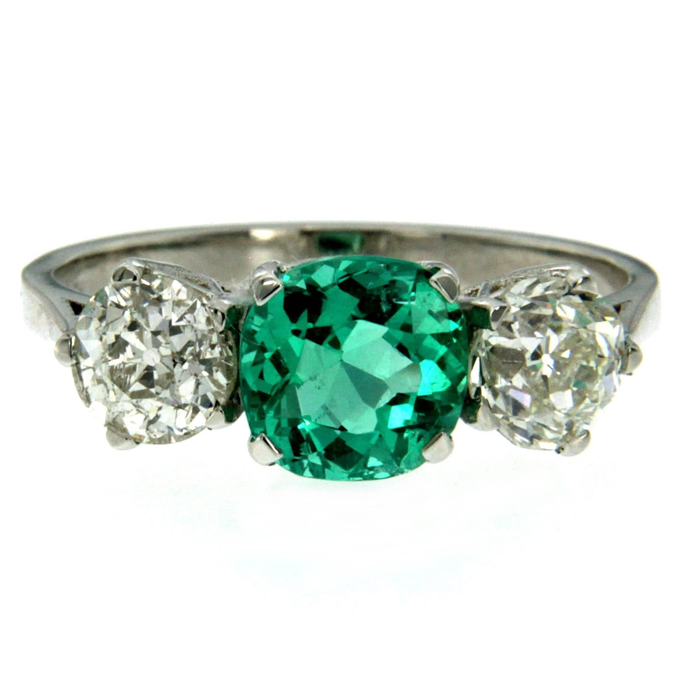 Natural Unenhanced Colombian emerald and diamond Platinum ring, circa 1930.