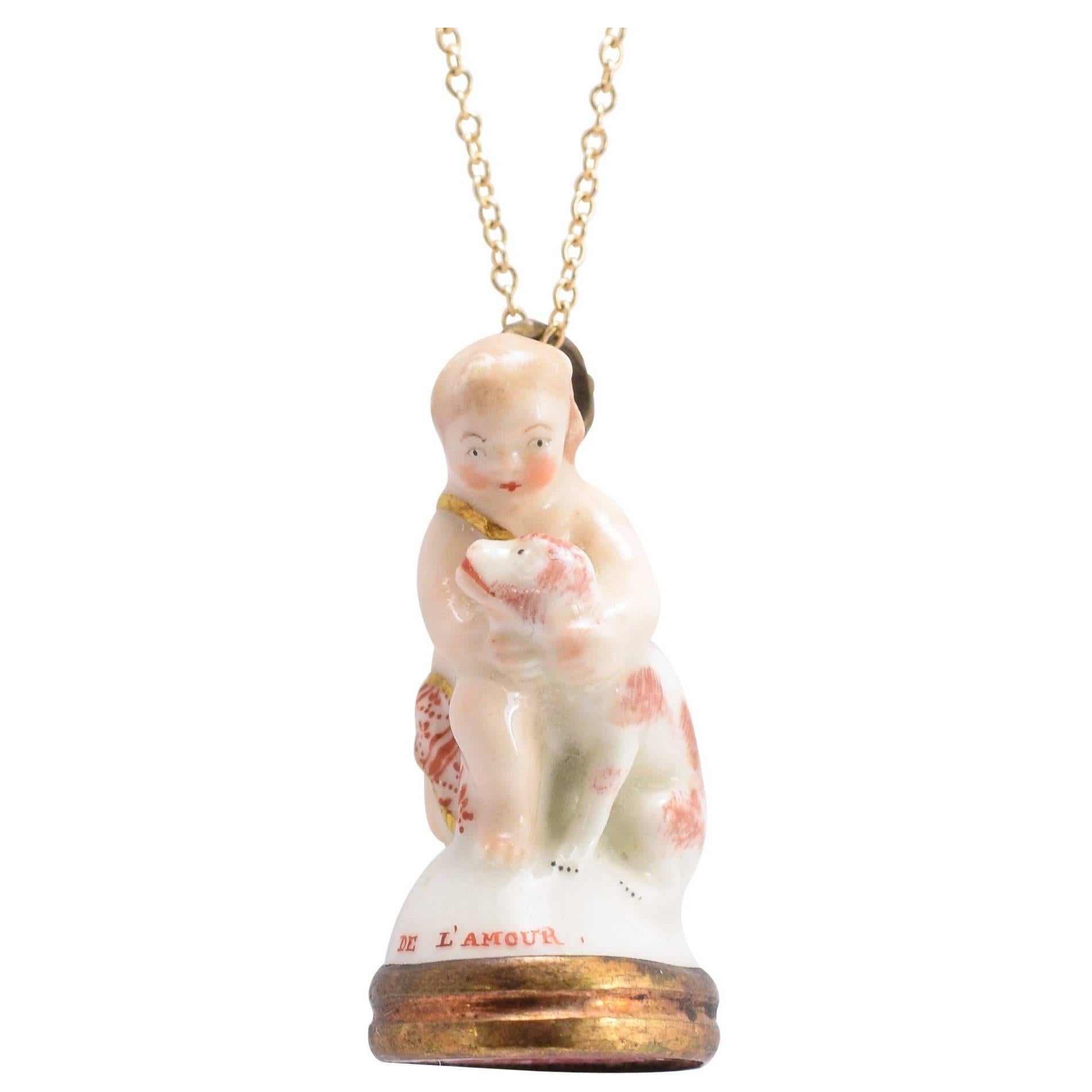 18th Century Derby Chelsea Porcelain “Cupid Caressing Dog” Fob Pendant