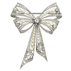 Pearl and 0.68Ct Diamond, Platinum Bow Brooch - Antique Victorian