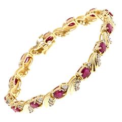 Ruby And Diamond Swirl Link Yellow Gold Bracelet