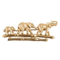 Cartier Emeraude Broche de famille éléphant en or jaune 18 carats