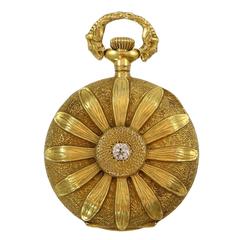 Gruen 14k yellow gold pendant watch with textured flower with diamond center 5