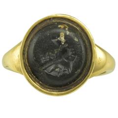 An Antique Gold and Black Hardstone Greco-Roman Intaglio Ring