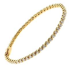 Bracelet tennis Cartier en or et diamants