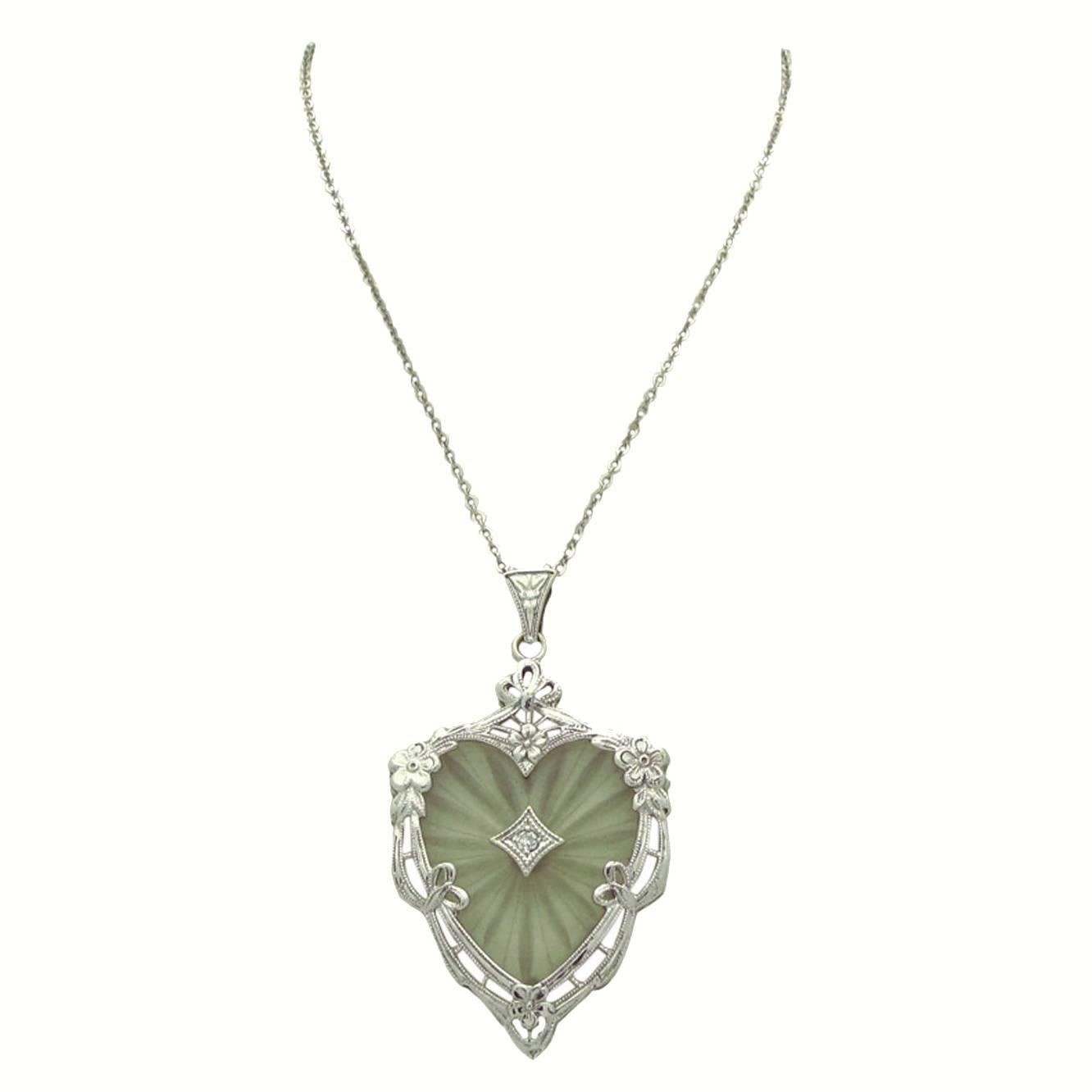 This stunning Art Deco 'Crystal Ray' Necklace is exemplified by the rays pulsating from a center diamond into this beautiful heart shape. Certainly a wonderful gift to bestow on your amour.