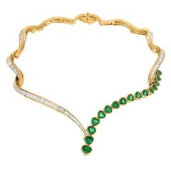 1980s Colombian Heart Shaped Emerald Diamond Gold Baguette Necklace