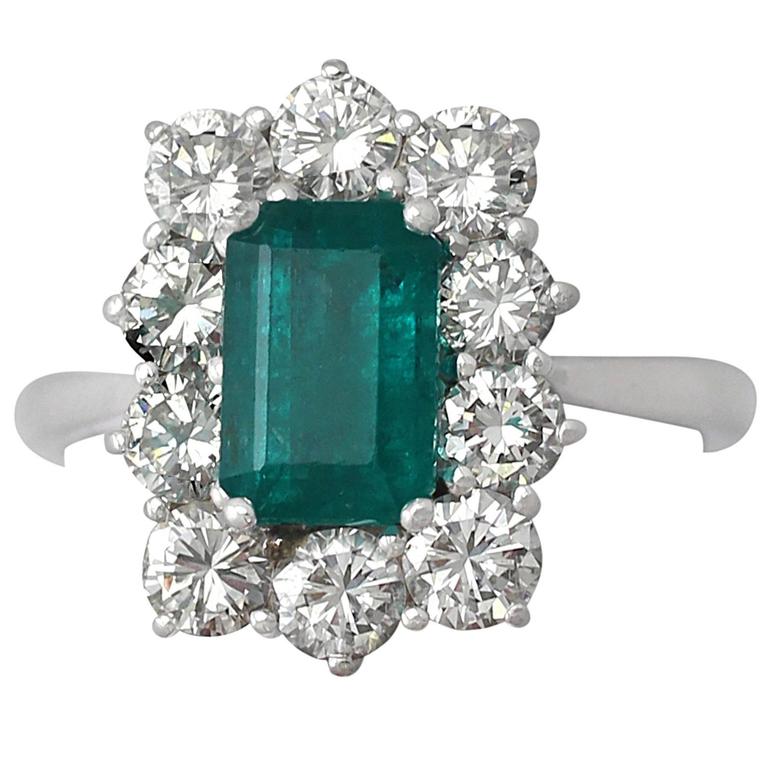 1.57Ct Emerald and 1.72Ct Diamond, 18k White Gold and Cluster Ring