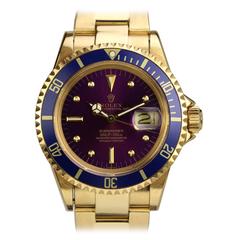 Montre-bracelet Rolex Submariner Date Purple Haze en or jaune Ref 1680