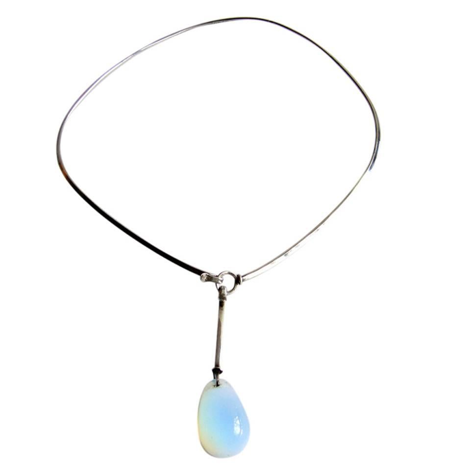 Rare sterling silver and teardrop shaped stone necklace designed and created by Vivianna Torun Bülow-Hübe.  This necklace was made by Torun prior to her years with the Jensen Silversmithy, in Biot, France.  Necklace features a stunning opalescent,