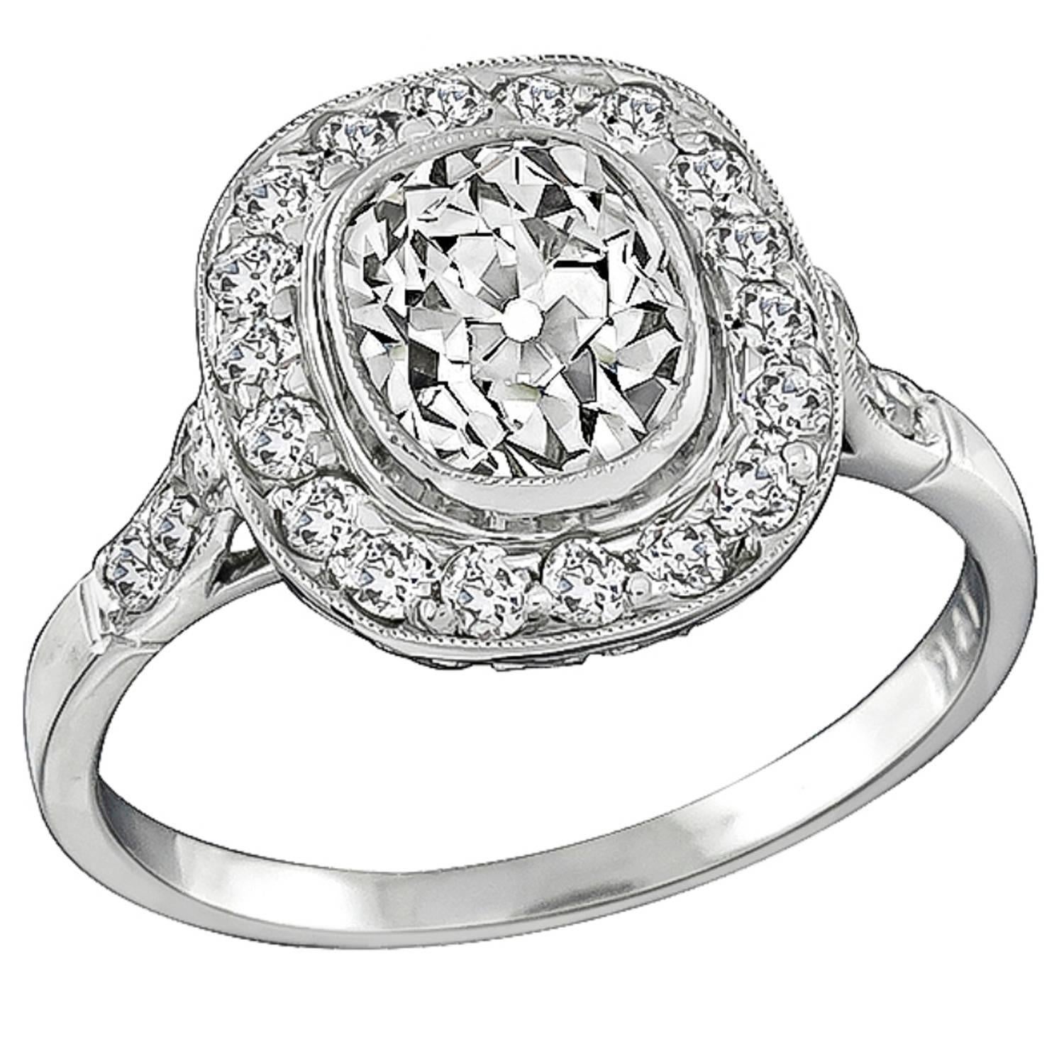1.45 Carat GIA Certified Old Mine Cut Diamond Platinum Halo Engagement Ring For Sale