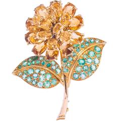 René Boivin rare gold, citrine and emerald flower brooch
