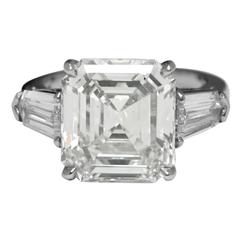 8.bague de fiançailles en platine avec diamant taille émeraude de 02 carats