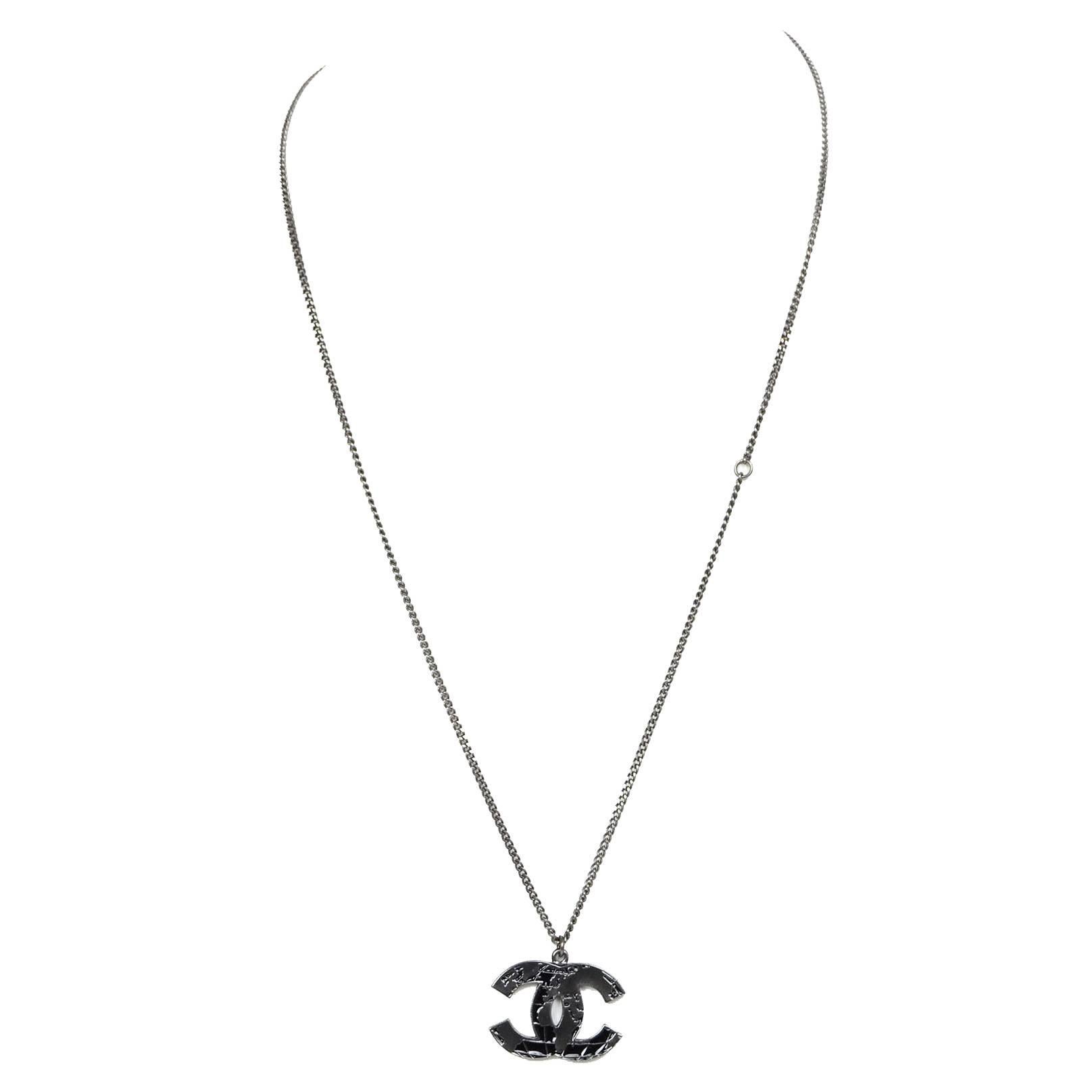 Chanel Gunmetal Adjustable Globe CC Logo Necklace For Sale at 1stDibs | chanel  cc logo necklace, chanel logo necklace, chanel necklace black logo