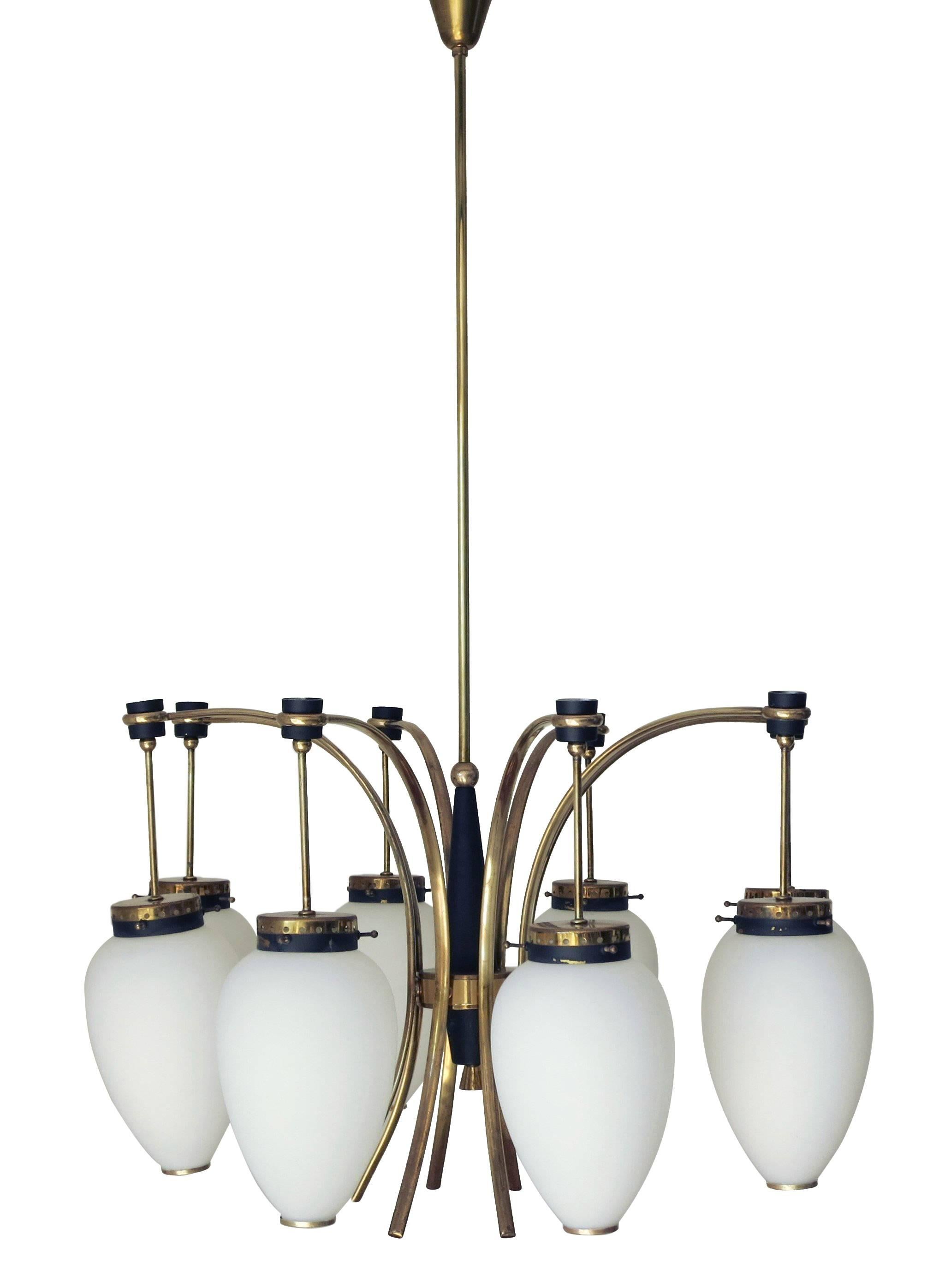 Original vintage chandelier with drop shaped matte white Murano glass shades, mounted on brass frame / Designed by Stilnovo circa 1950’s / Made in Italy 
8 lights / E12 type / max 40W each
Diameter: 27 inches / Height: 43.5 inches including rod and