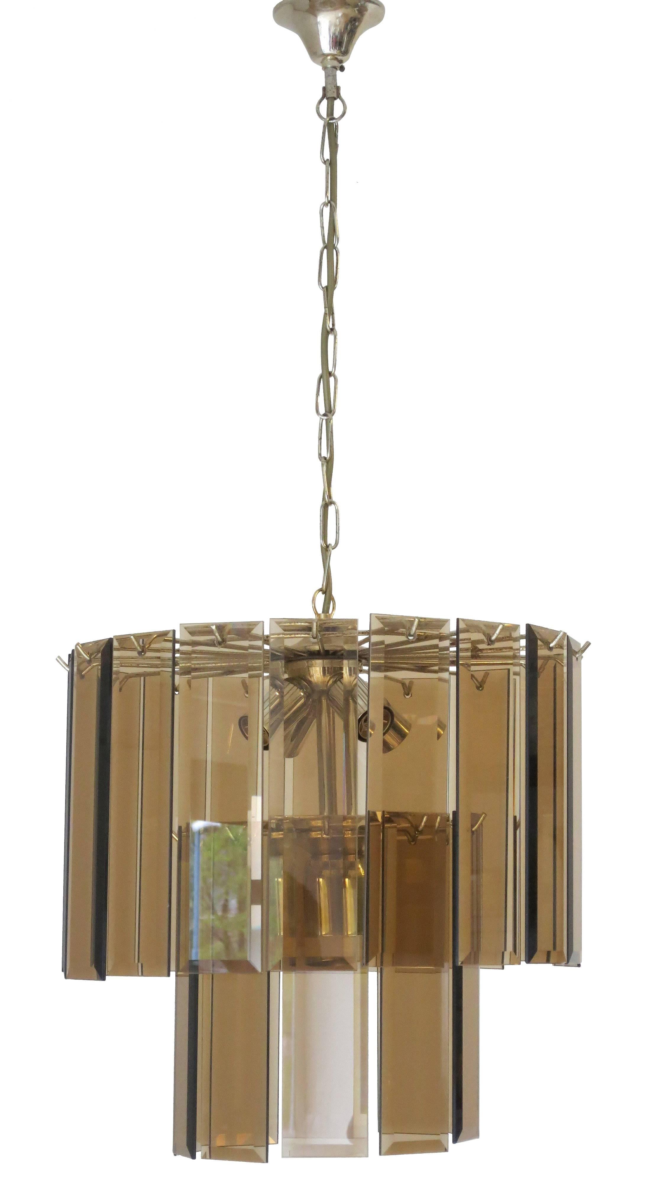 Original vintage Italian pendant with smoky beveled glasses mounted on brass frame / Designed by Cristal Arte circa 1960’s / Made in Italy 
5 lights / four E12 type,  one E26 type / max 40W each
Diameter: 15.75 inches / Height: 15.75 inches
1 in