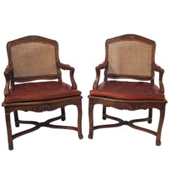 Pair of French Regence Walnut Fauteuils Armchairs