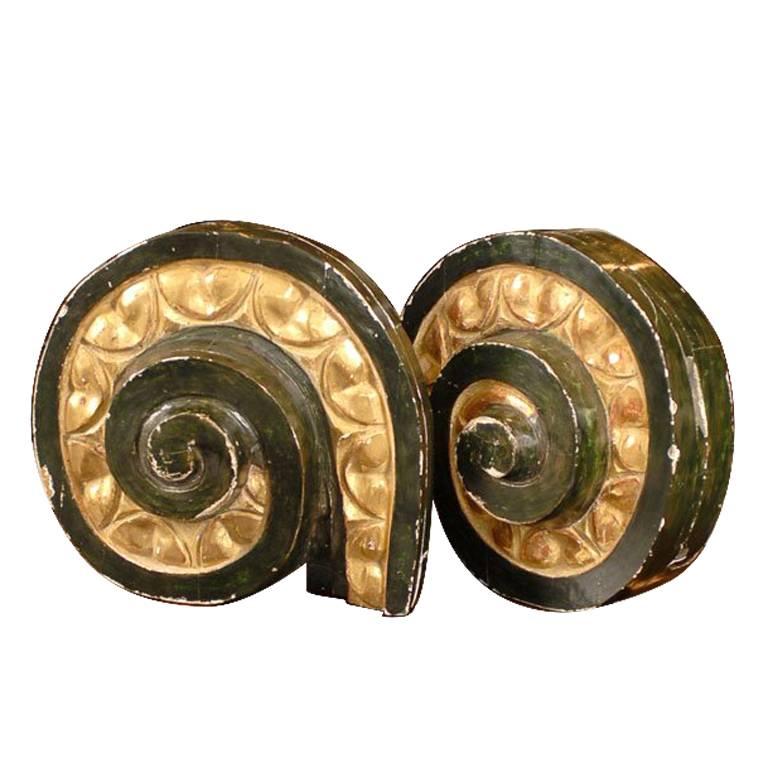 Pair of 19th century black and gilt scrolled Italian fragments.
  